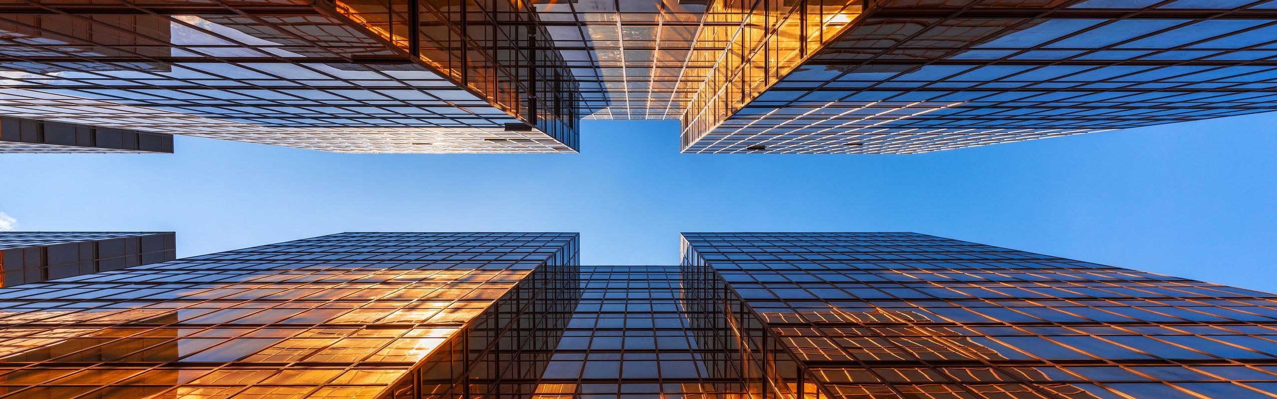 Worm's eye view of skyscrapers up to sky