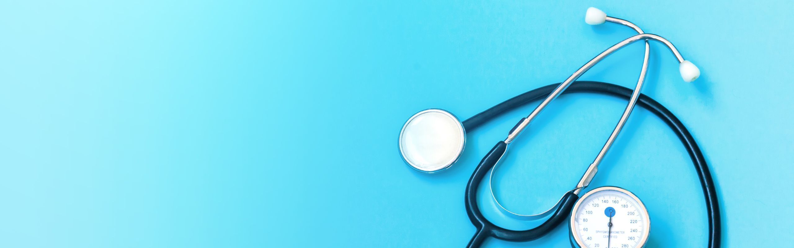 Image of stethoscope against a blue background