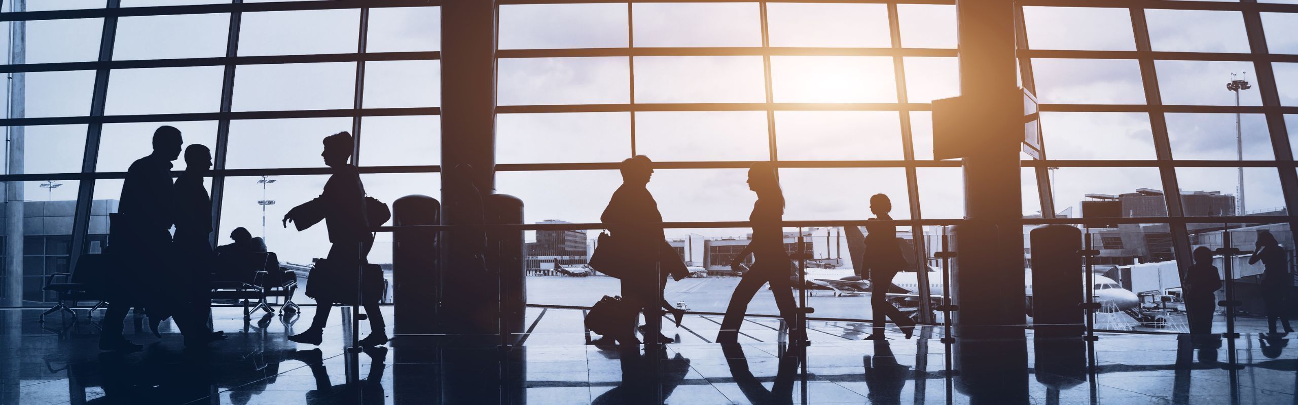 Image of people walking in an airport