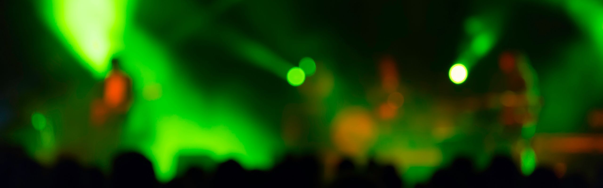 Blurred image of green stage lights