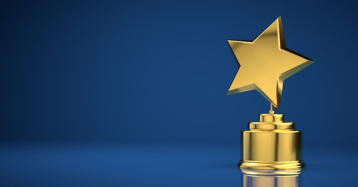 Blue banner graphic with yellow award star